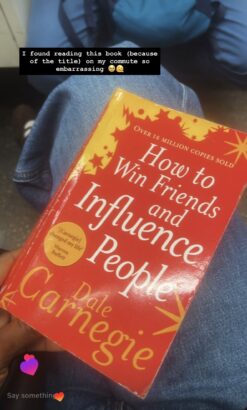 A blurry photo of How to Win Friends and Influence People by Dale Carnegie